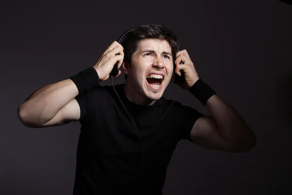 Young Man listening to music — Stock Photo, Image