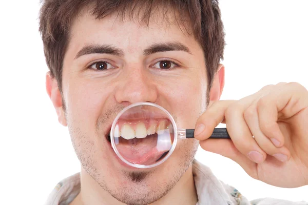 Muž zkoumání zuby — Stock fotografie