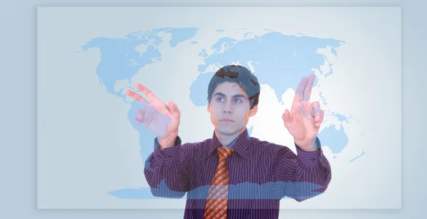 Empresario tocando un mapa del mundo — Foto de Stock