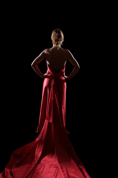 Attraente ragazza bionda in abito rosso — Foto Stock