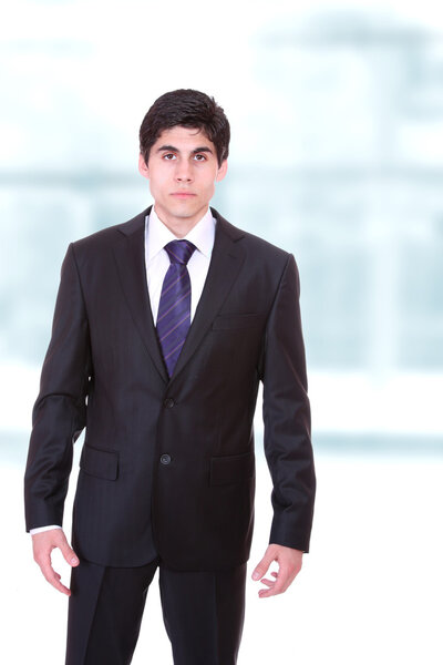 Young business man standing