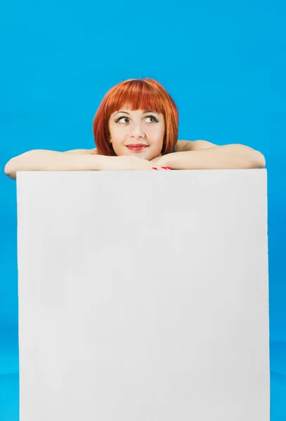 Red girl on blank cube — Stock Photo, Image