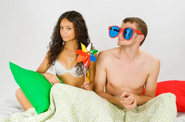 Couple having fun at the bed — Stock Photo, Image