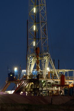 Drilling Rig at Night clipart