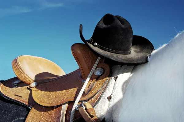 Hat and Saddle — Stock Photo, Image