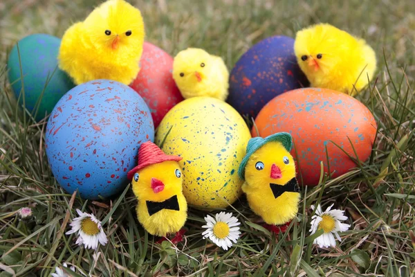 Colored easter eggs on grass lawn — Stock Photo, Image