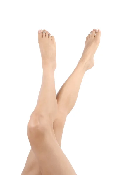 Mujer piernas y pies aislados sobre blanco — Foto de Stock