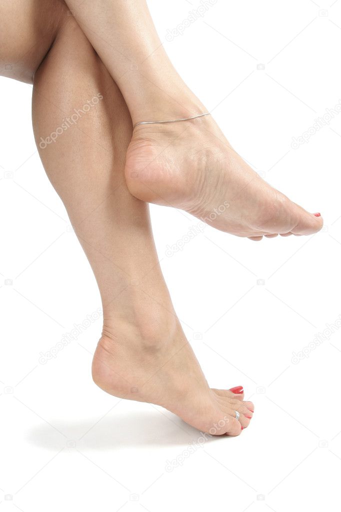 Woman feet and isolated over white