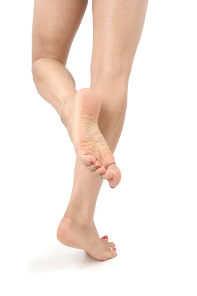 Kadın bacaklar ve ayaklar üzerinde beyaz izole — Stok fotoğraf