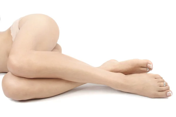 Mulheres pernas sobre branco — Fotografia de Stock