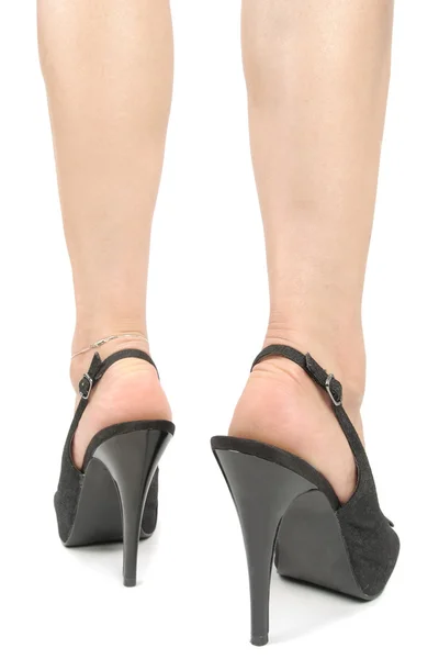 Žena nohy s vysokými podpatky — Stock fotografie