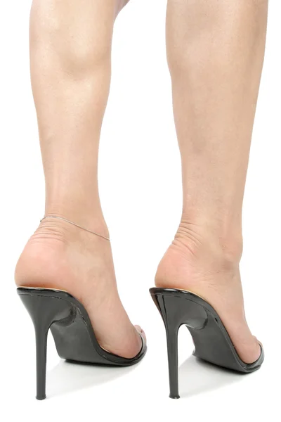 Žena nosí černé boty na podpatku — Stock fotografie
