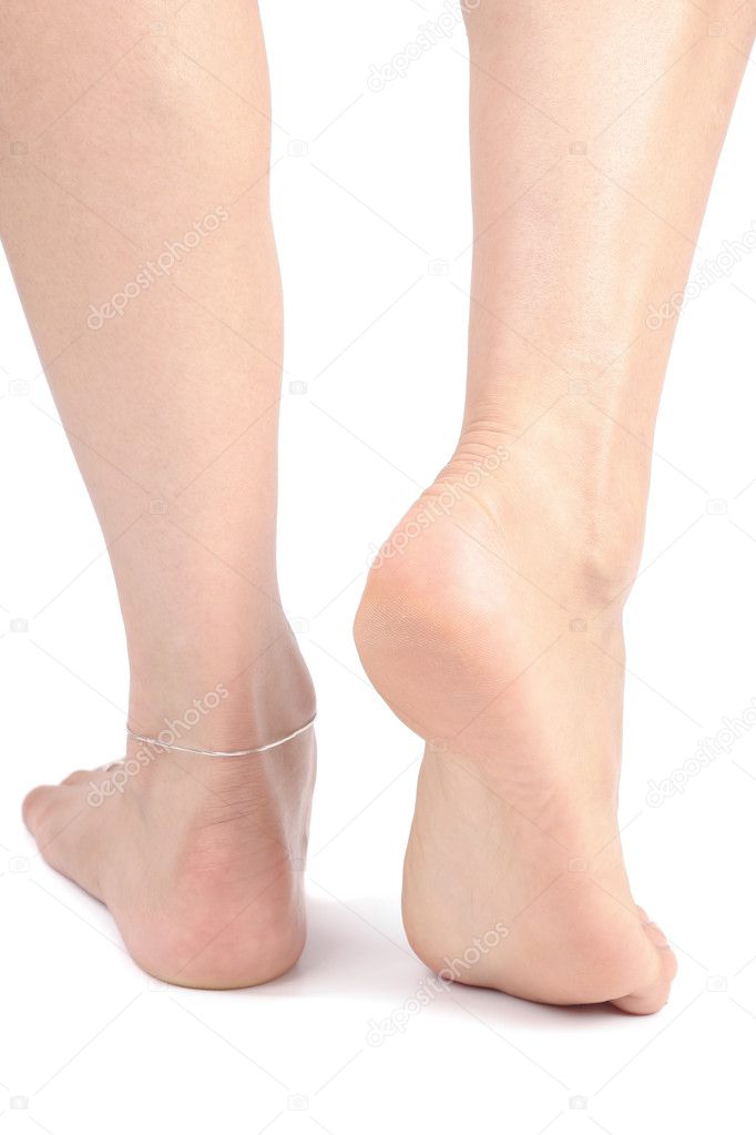Womans feet over white