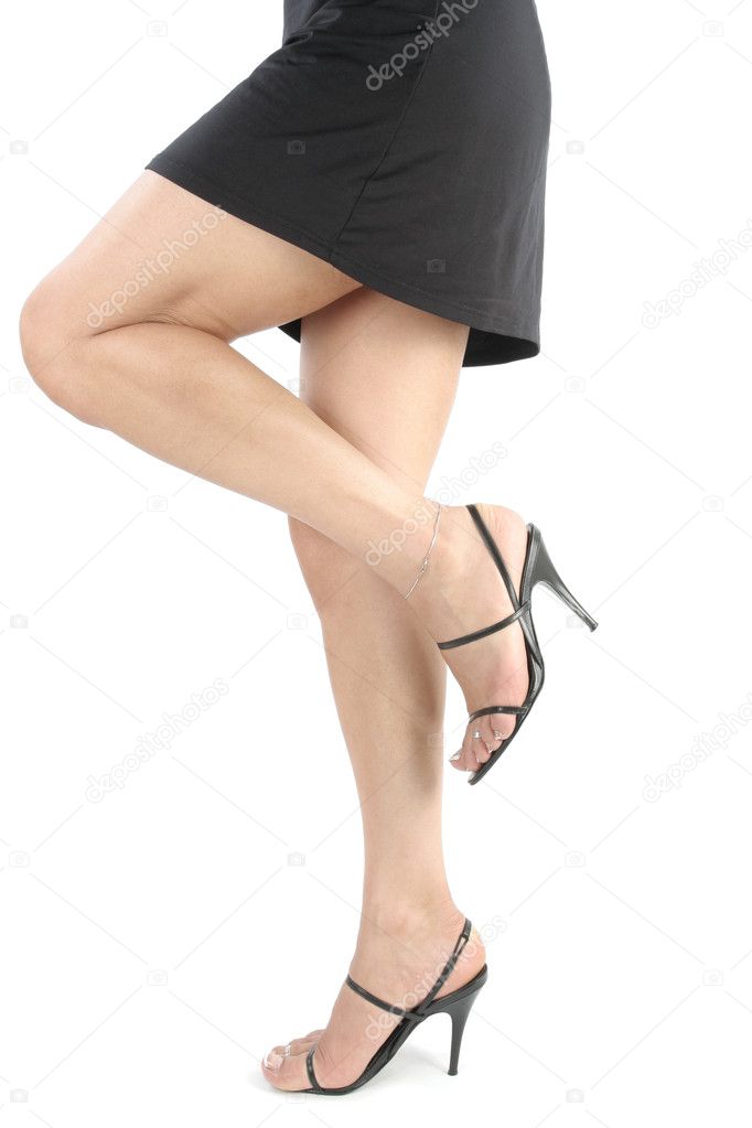 Womans legs with short black dress