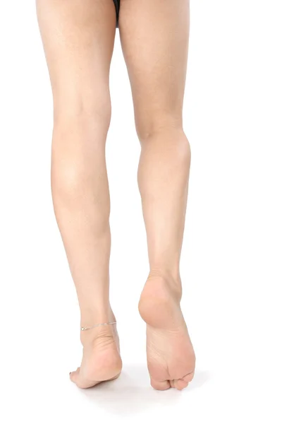 Zenske nohy přes bílý — Stock fotografie