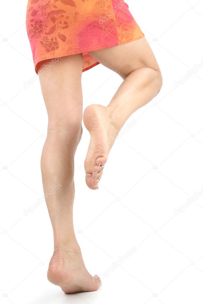 Woman legs and feet with shirt skirt