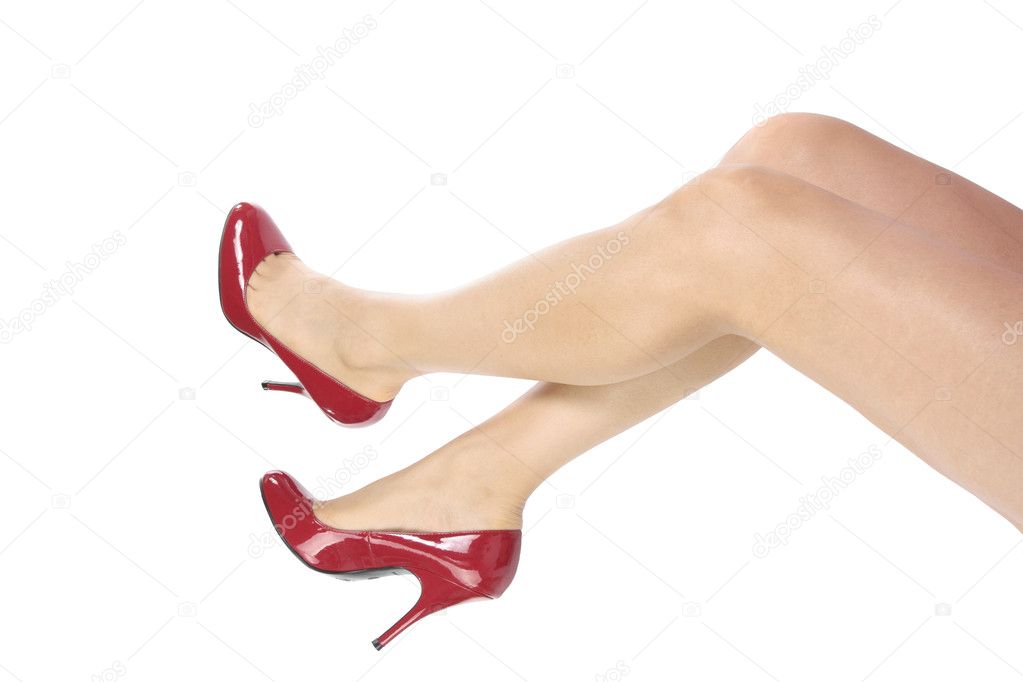 Woman legs and red heel shoes