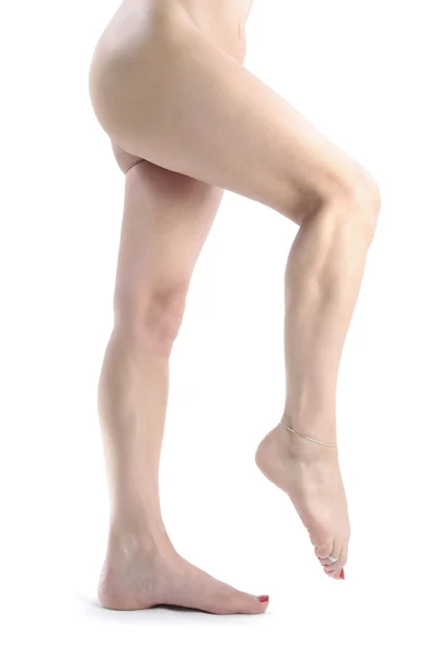Pernas de mulher sobre branco — Fotografia de Stock
