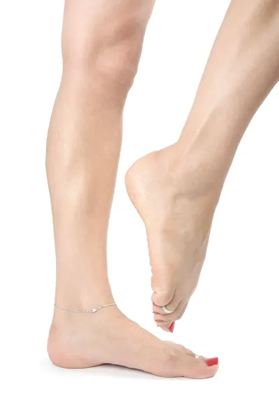 Žena nohy přes bílý — Stock fotografie