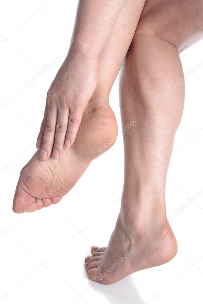 Woman feet over white