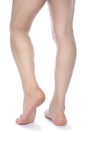 Kvinna ben isolerade över vit bakgrund — Stockfoto