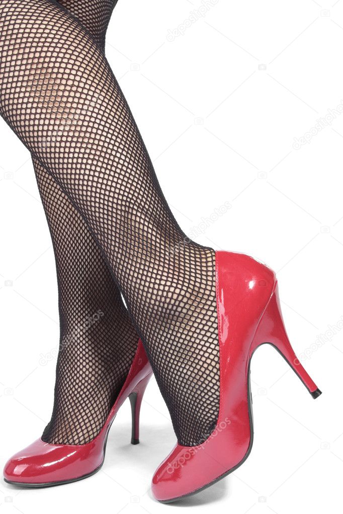 Beautiful woman legs tights with red heels over white backgro
