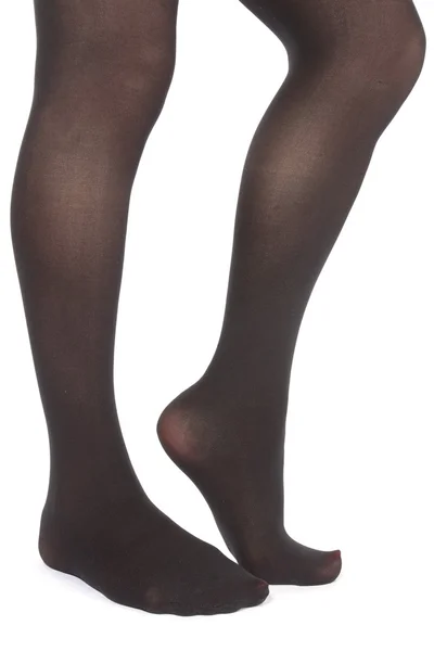 Женские ноги с колготками на белом фоне — стоковое фото
