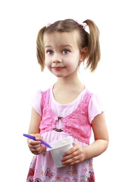 Criança comendo iogurte — Fotografia de Stock