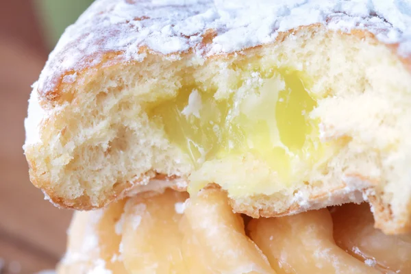 Lemon filled jelly donut — Stock Photo, Image