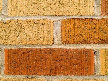 Orange, Red, and Tan Brick Wall Background clipart