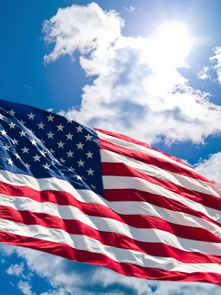 アメリカの国旗と cloudscape ストック画像