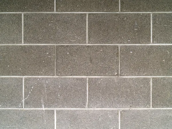 Cinzas cinza e branco bloco parede fundo — Fotografia de Stock