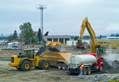 Heavy Duty construction equipment at work site clipart