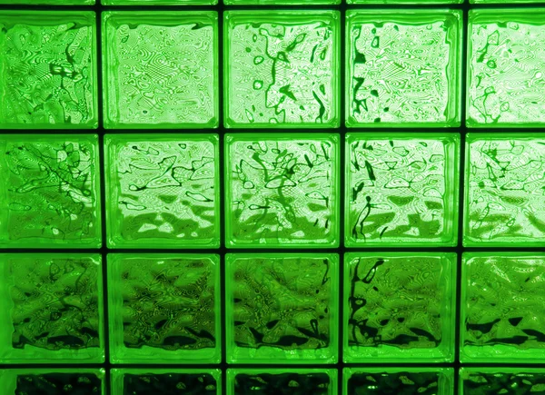 Abstrato de uma janela de bloco de vidro de tom verde — Fotografia de Stock