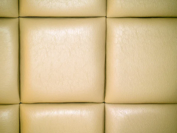 Blek tan läder upholstry bakgrund med ett rep — Stockfoto