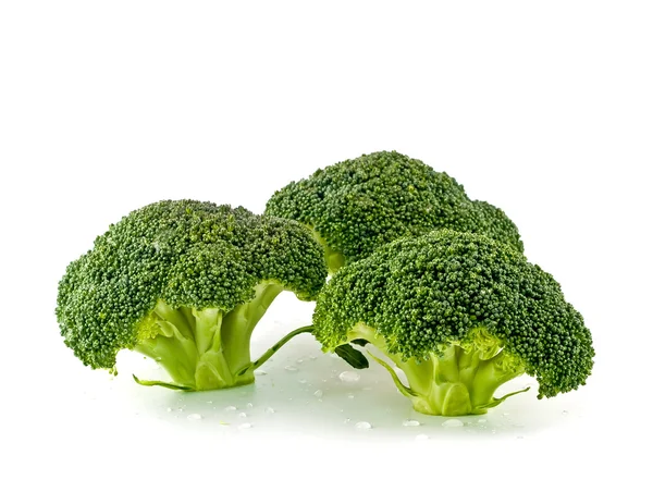 Piezas de brócoli frescas, crudas y verdes, cortadas y listas para comer — Foto de Stock