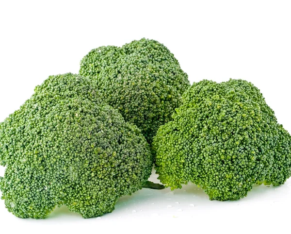 Piezas de brócoli frescas, crudas y verdes, cortadas y listas para comer — Foto de Stock