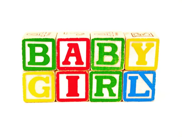 スペルの単語の赤ちゃん女の子カラフルなアルファベットブロック — ストック写真