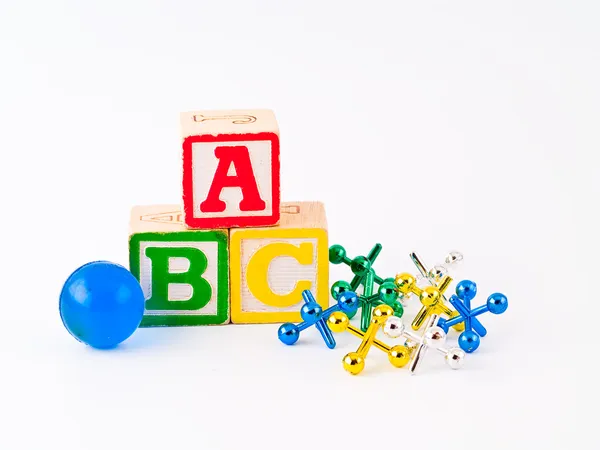Colorful Alphabet Blocks ABC and Jacks as a Childrens Theme — Stock Photo, Image