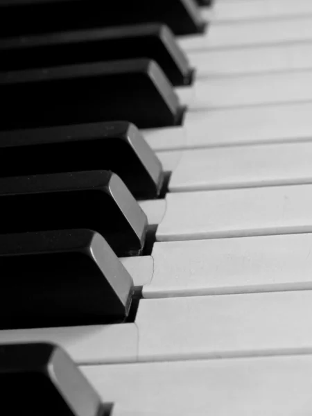 Piano keys of a very well loved and often played piano — Stock Photo, Image