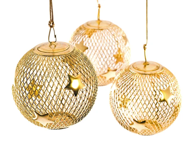 Golden Christmas ornaments isolated on a blank background — Stock Photo, Image
