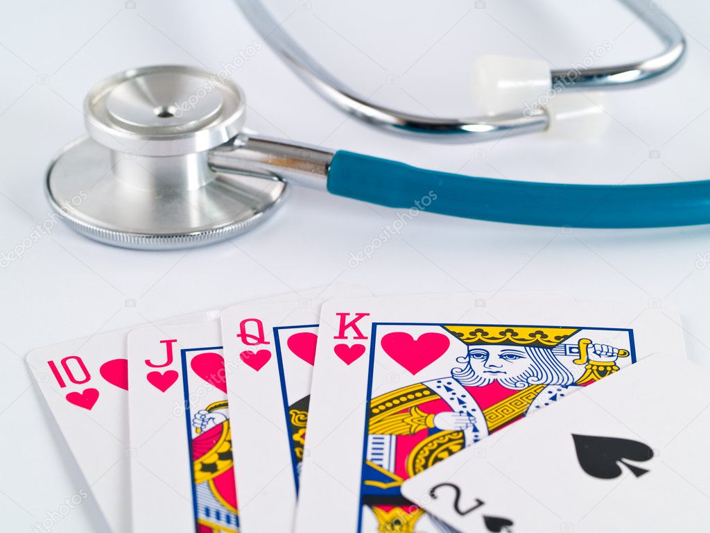 Stethoscope and Playing Cards as a Gambling with your Health Concept
