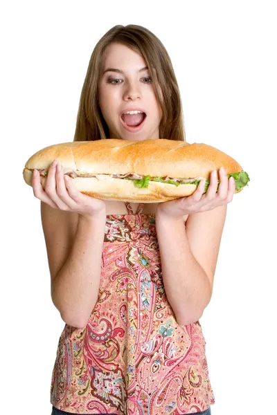 Tjej äter smörgås — Stockfoto