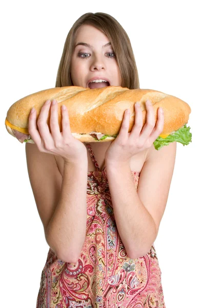 Menina mordendo sanduíche — Fotografia de Stock