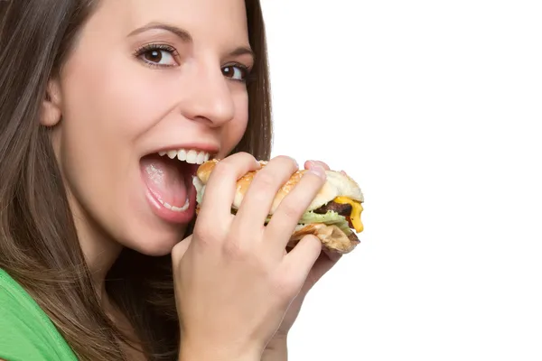 Donna che mangia hamburger — Foto Stock