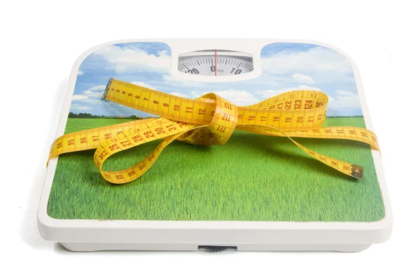 Escala de peso con cinta métrica — Foto de Stock