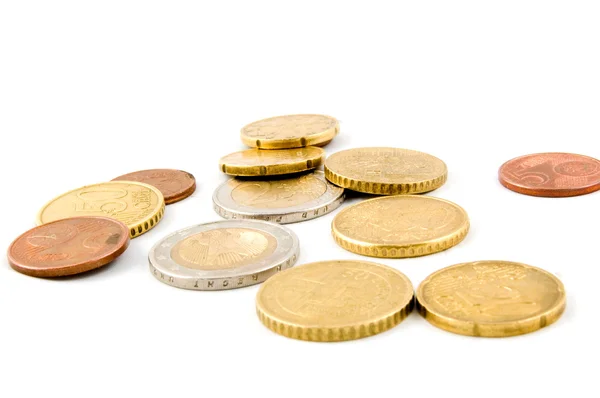 stock image Small eurocoins on white background