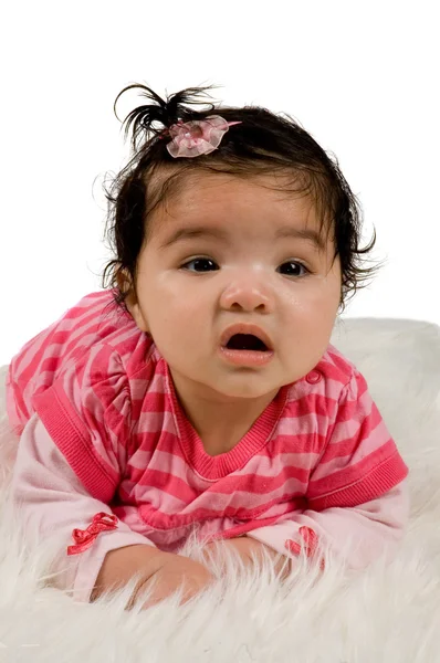 Four months old baby laying on carpet — Stock Photo, Image