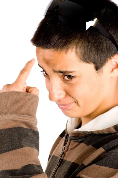 Teenage boy is pointing to his forhead — Stock Photo, Image