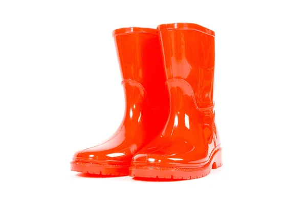 Stivali da pioggia per bambini rossi Foto Stock